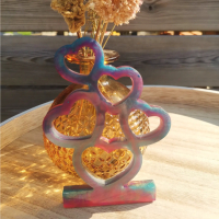 Hartjes op stapel in kaarsenhouder